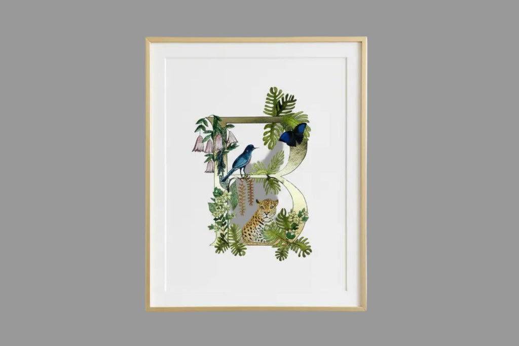 Decorative letter 'B' with a bird, leopard, and butterfly on a white background
