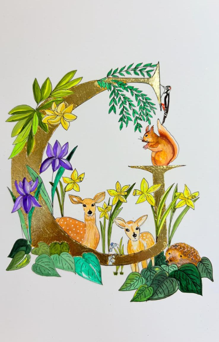 Gilded gold letter G for gorgeous woodland animals