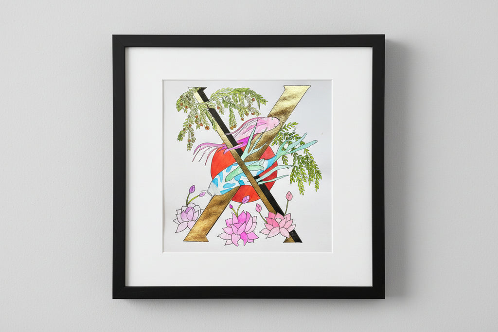 Gilded gold letter X